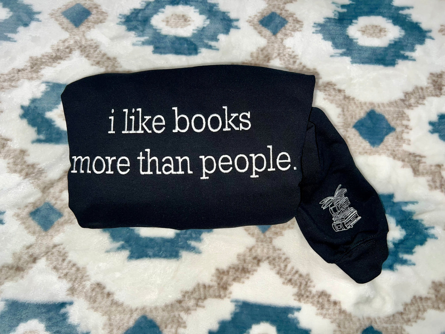 Book saying Sweatshirts